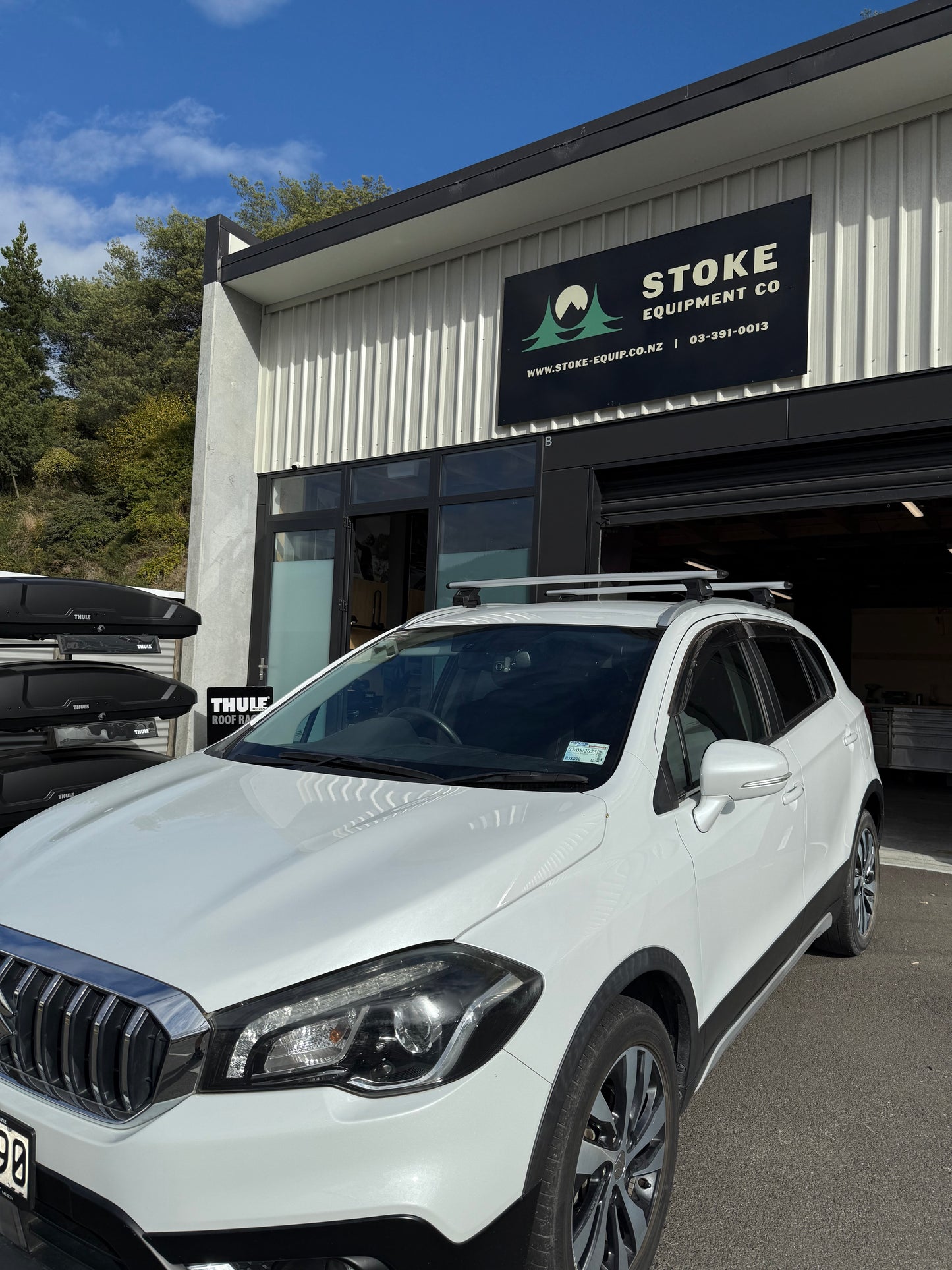 Suzuki S-Cross with Thule WingBar Evo Silver Roof Racks