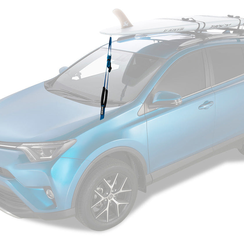 Light blue SUV with a surfboard on a white background