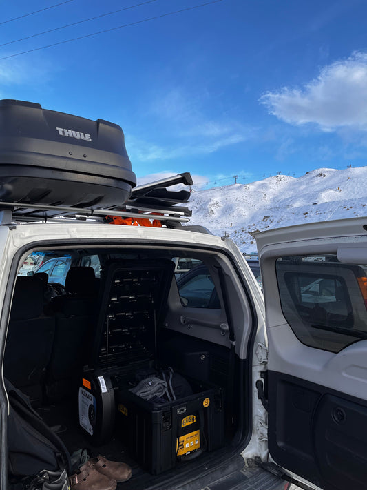 NZ ski road trip with roof racks loaded for winter