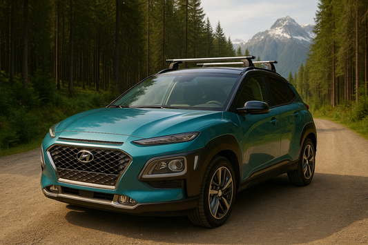 Hyundai Kona with Thule roof racks parked on a forest road with snow-capped mountains — ideal for highlighting the highest-rated Thule rack options in New Zealand.