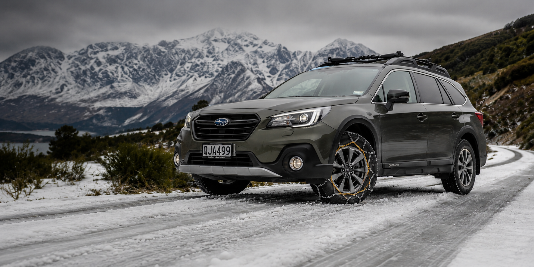 Snowy Alpine Road with Konig snow chains on Subaru Outback