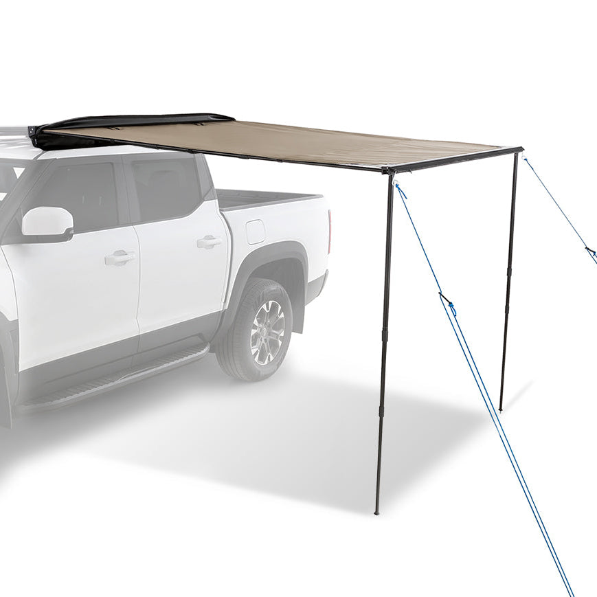 White truck with a roof rack and rhino-rack 2m awning on a white background