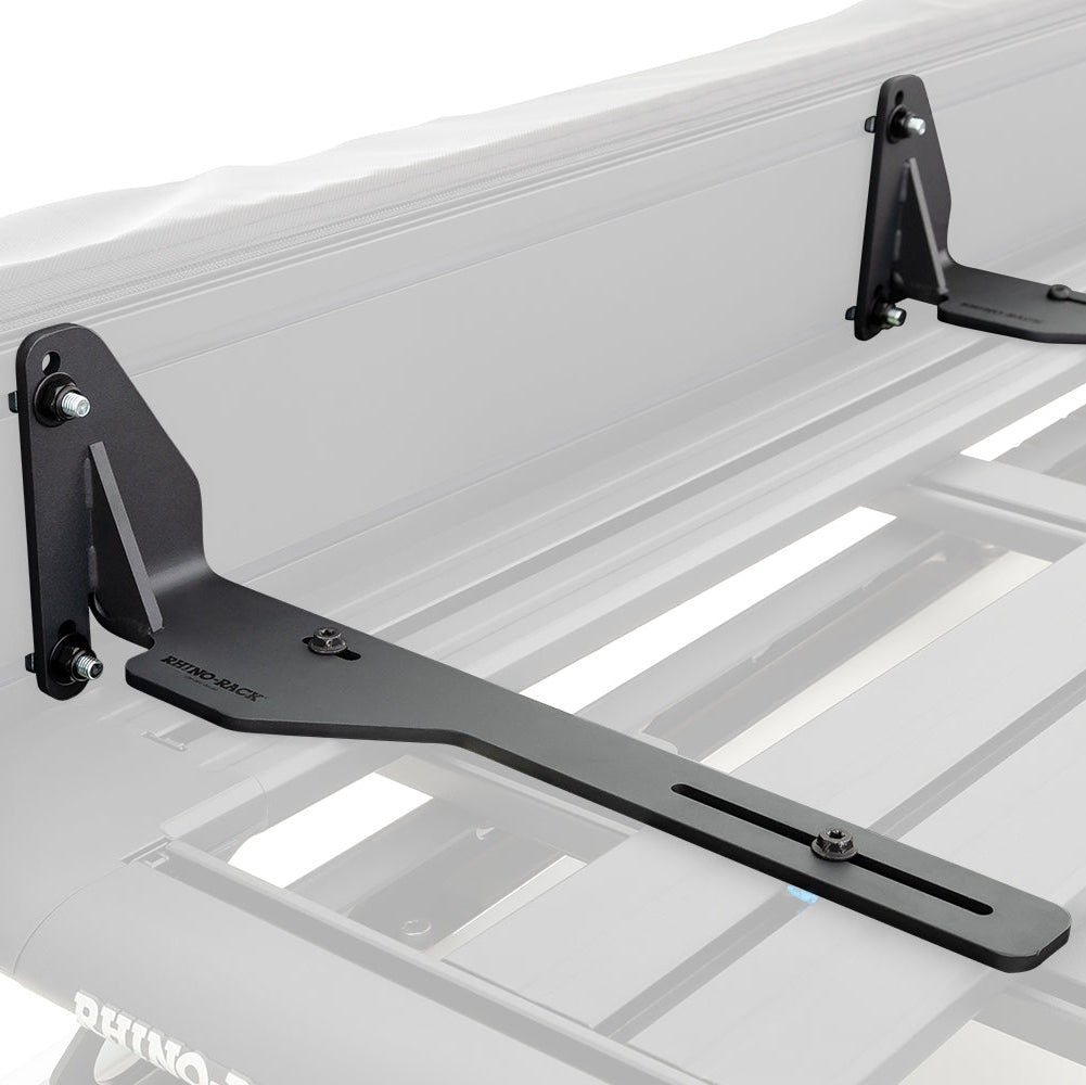 Roof rack system on a vehicle with visible brand logo.