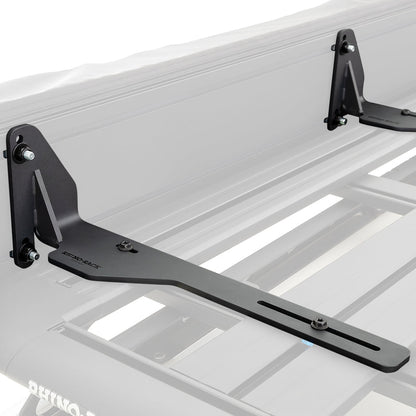 Roof rack system on a vehicle with visible brand logo.