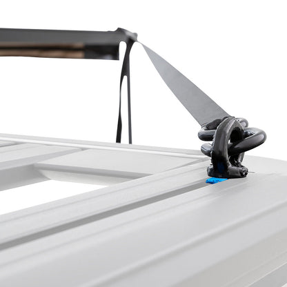 Close-up of a roof rack system on a vehicle with a white background