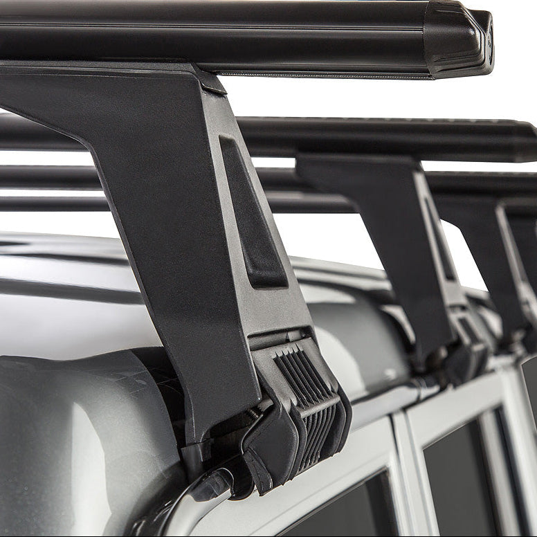 Close-up of a gutter mount car roof rack system on a vehicle