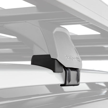 Roof rack crossbar with mounting bracket on a vehicle