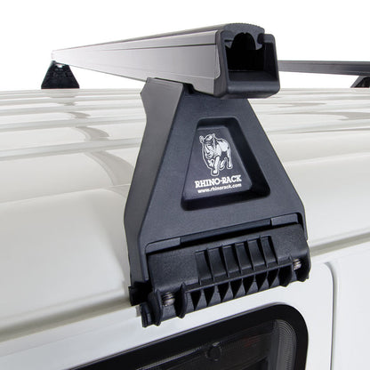 Roof rack system on a vehicle with 'rhino-rack' branding.