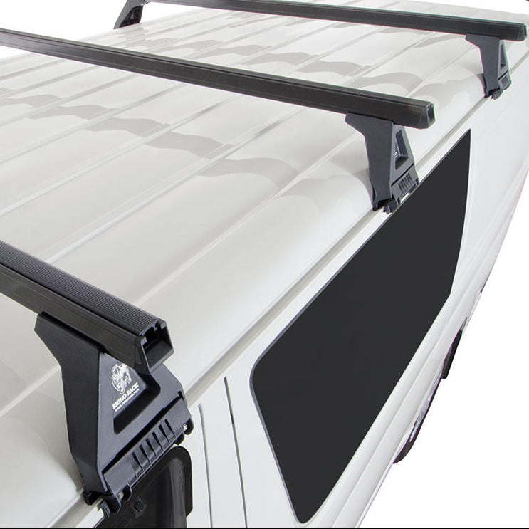 Roof rack system on a white vehicle with a clear background