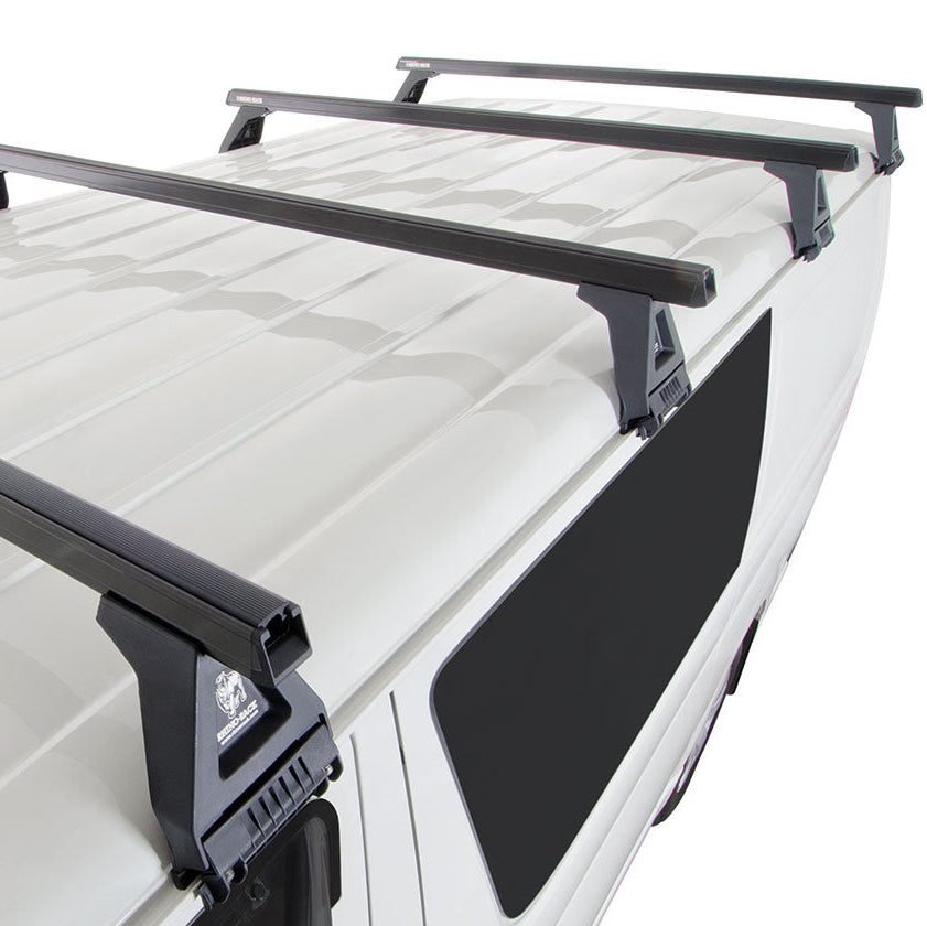 Roof rack system on a white vehicle with a clear background