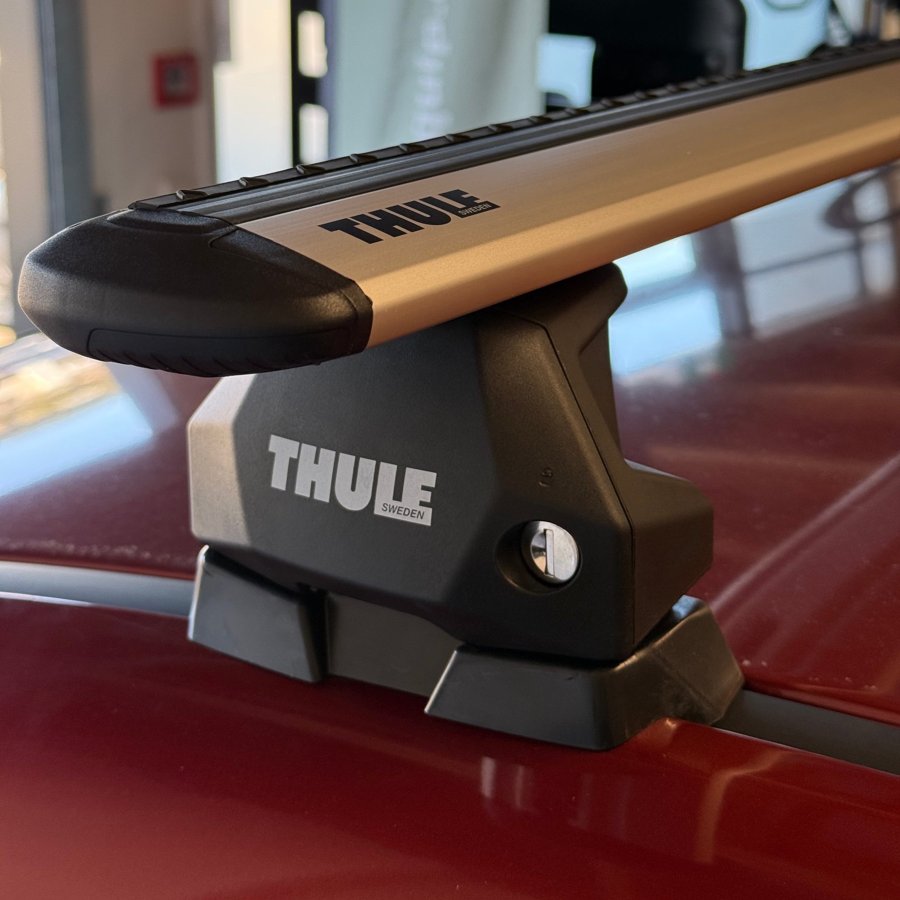 Thule fixpoint roof rack attached to a vehicle
