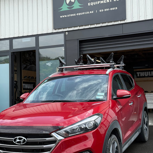 Hyundai Tucson 2015-2020 (w/ Flush Rail) - Thule WingBar Evo Roof Rack Silver