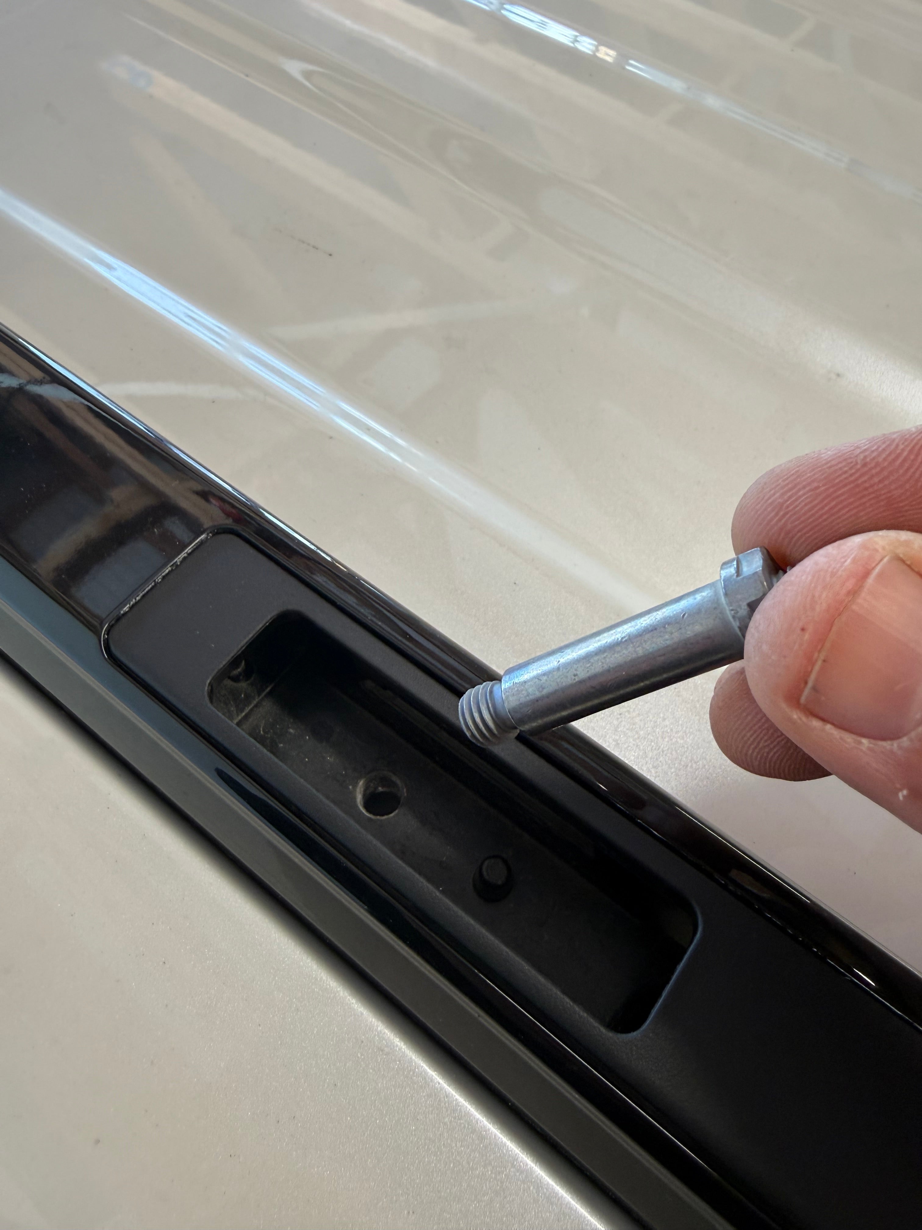 Thule fixpoint mount roof rack bolt installation reference image