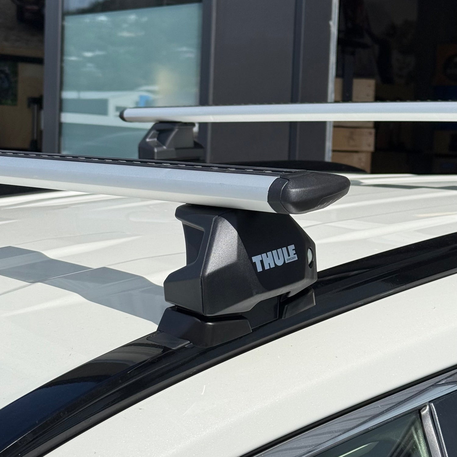 Thule WingBar Evo roof rack with flush mount design on vehicle roof