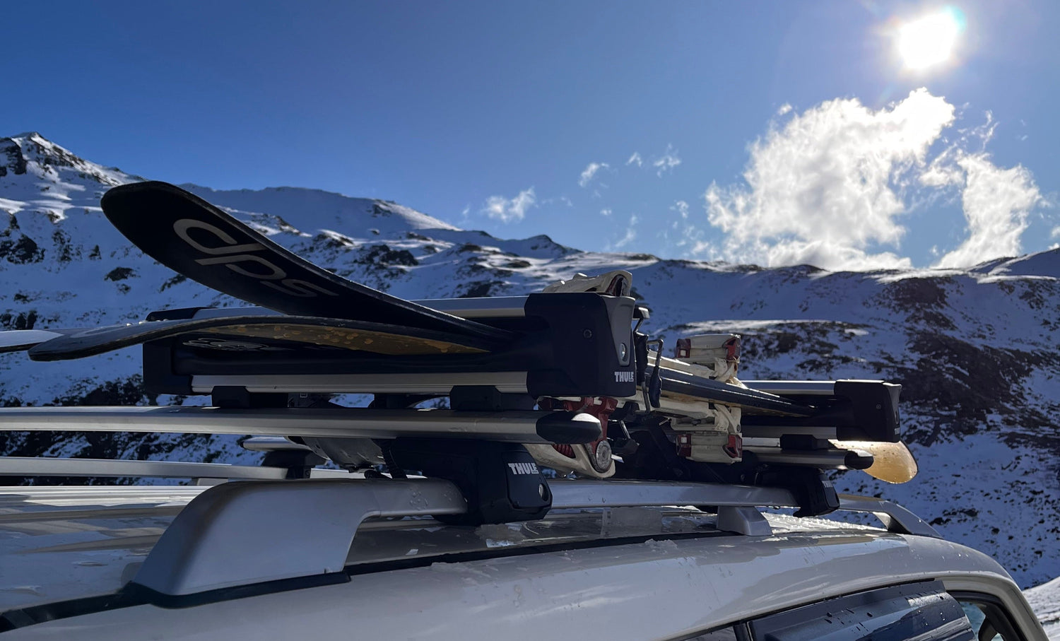 Thule snowpack ski and snowboard carrier in a ski resort carpark in Queenstown