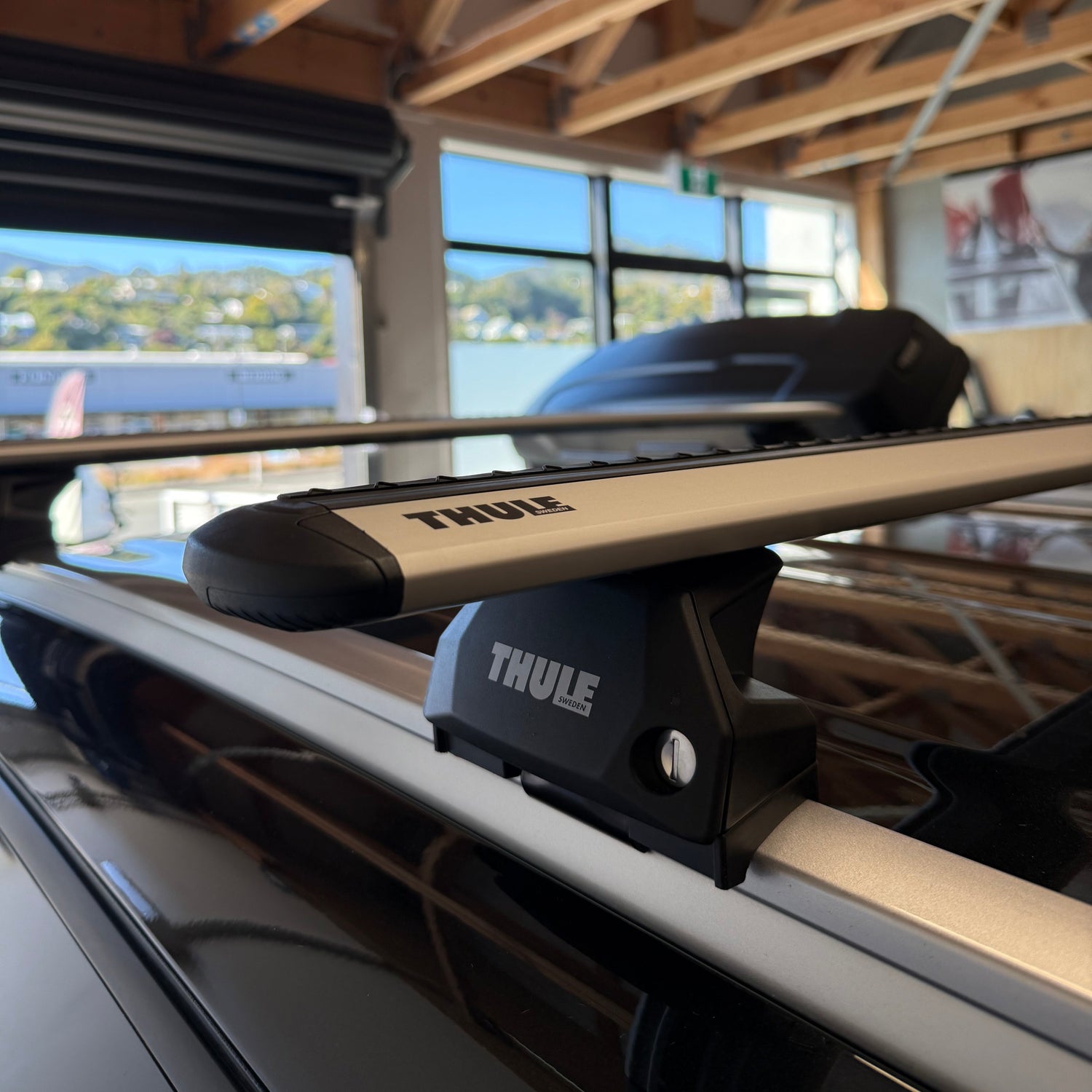 silver thule wingbar evo roof rack with flush rail mounting 