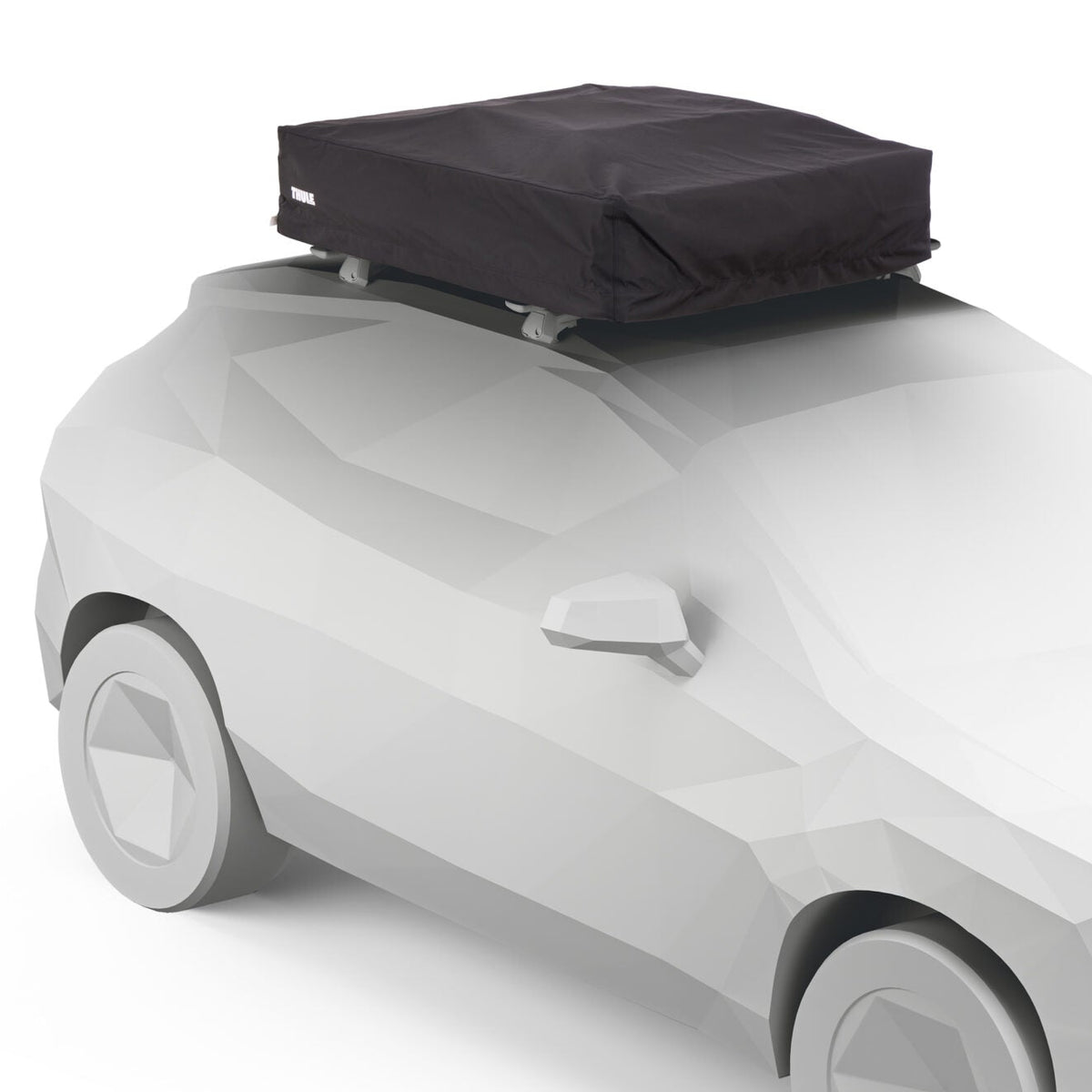 Car with a black roof box on a white background