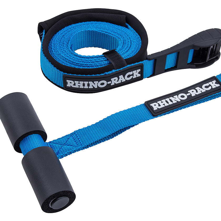 Two blue straps with black ends and 'Rhino-Rack' branding on a white background