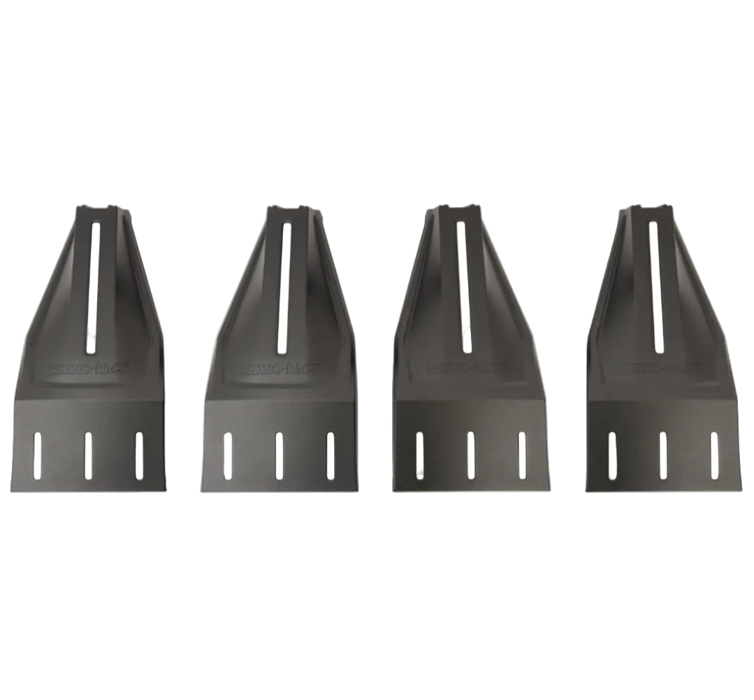Four black metal grate components on a white background