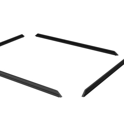 Four black metal side rails on a white background