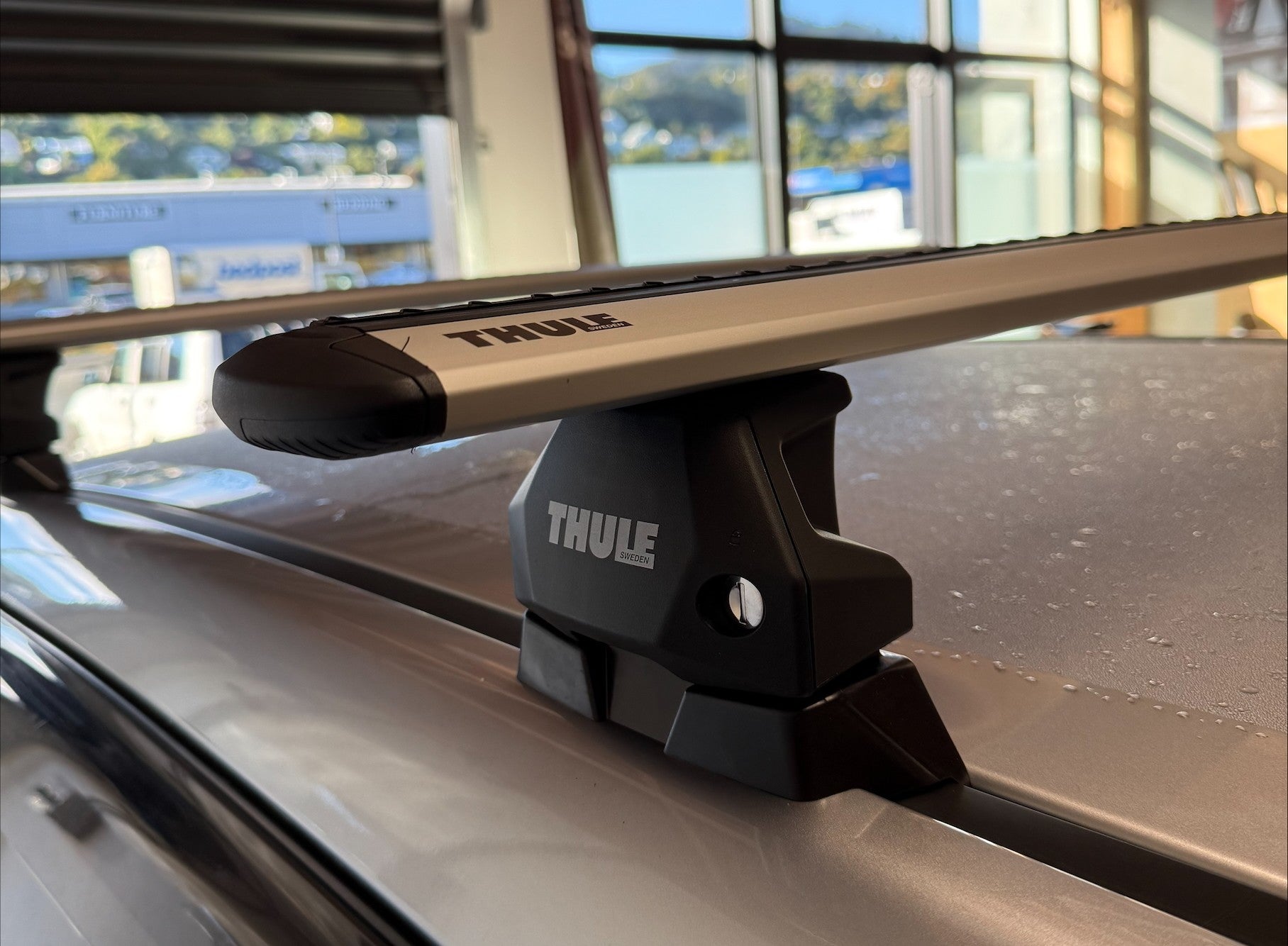 Silver Thule WingBar Evo Roof Rack, Fitted in Nelson showroom by roof rack specialists at stoke equipment co.