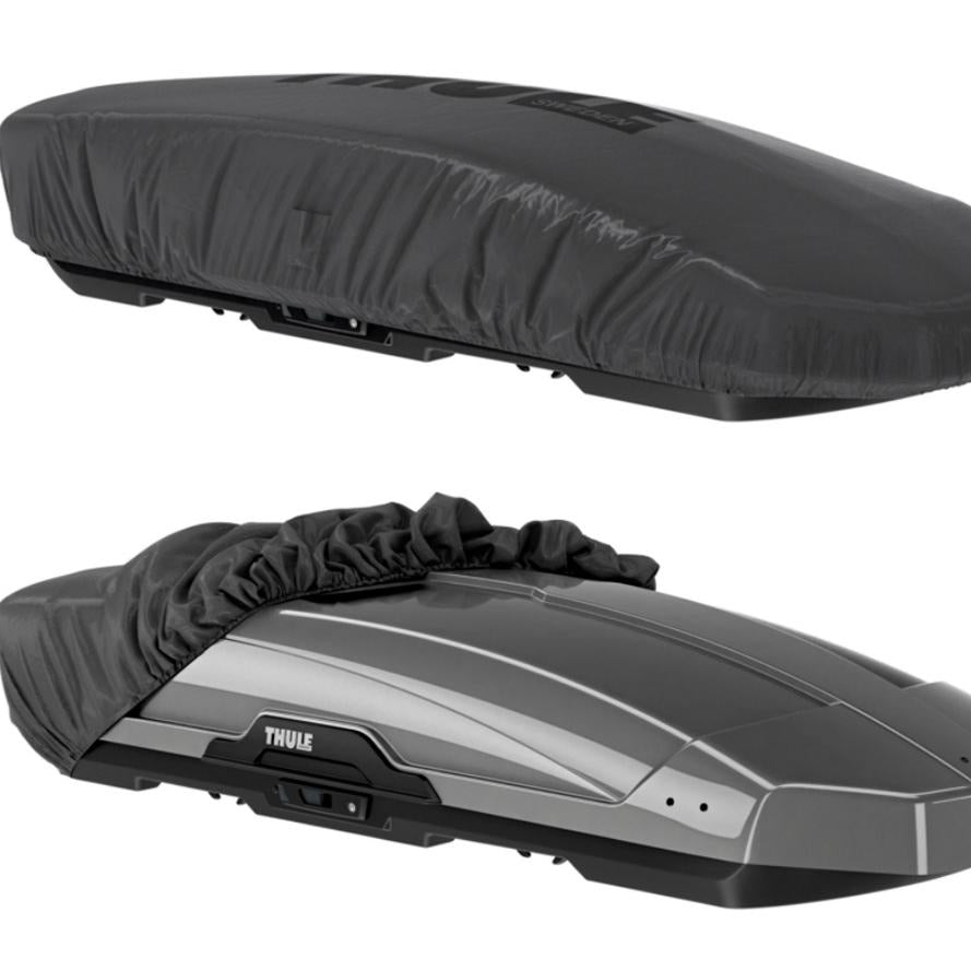 Two roof boxes with covers on a white background, featuring Thule branding.